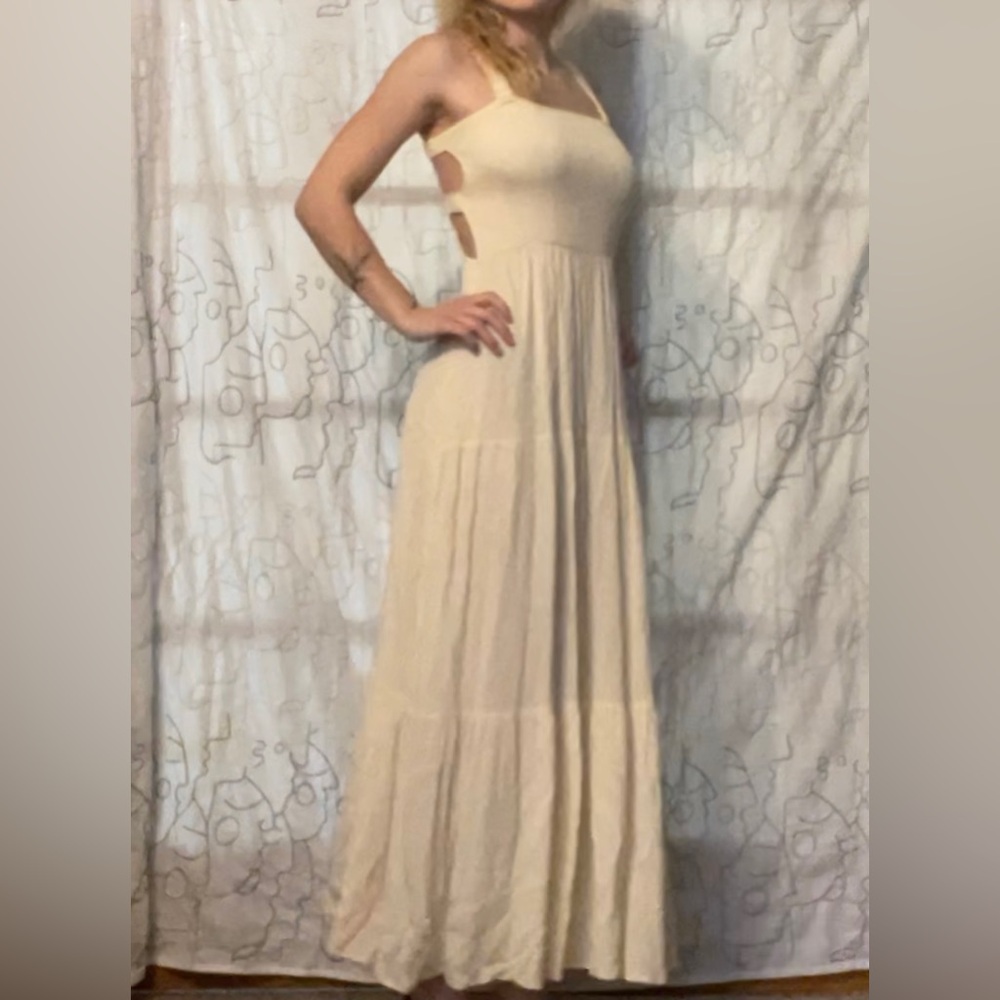 Light yellow backless summer dress, perfect for warm nights.